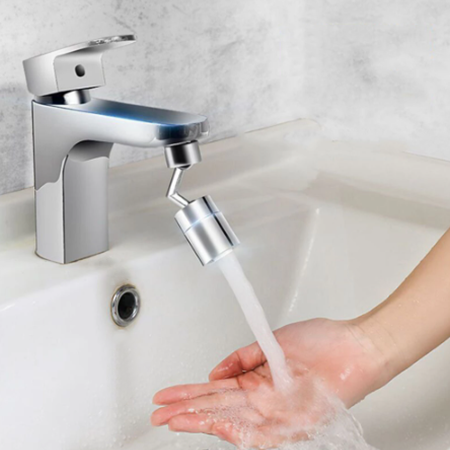 The bathroom sink spins the faucet freely