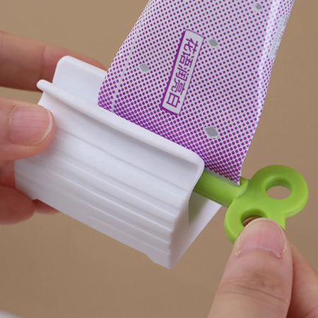 Toothpaste squeezer